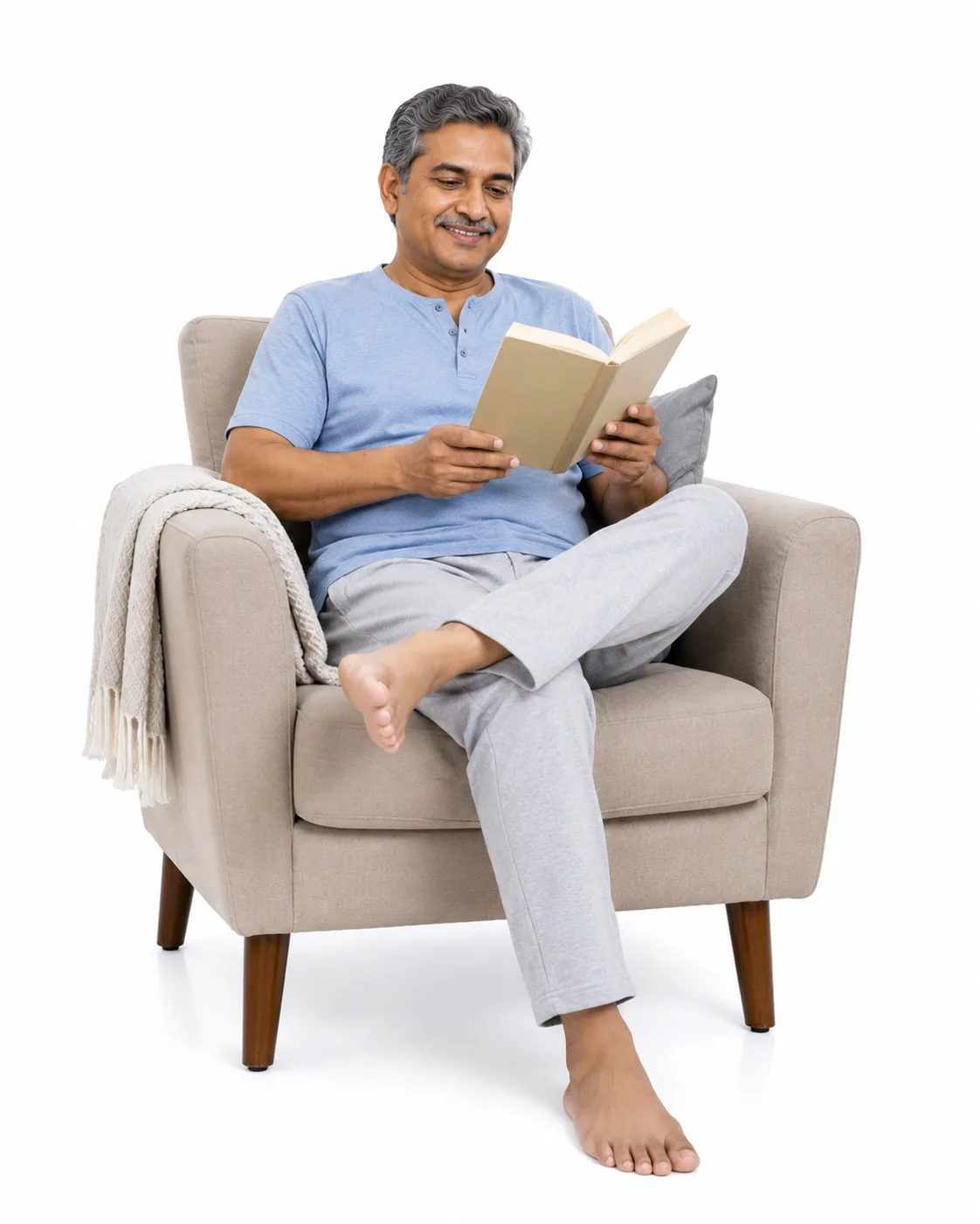 Older adult reading comfortably at home